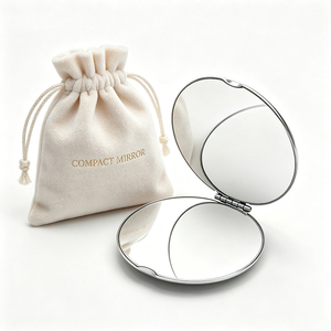 Miroir de maquillage rond en métal OEM avec construction en acier inoxydable durable, design double face pour coffrets cadeaux beauté - Product Image 1