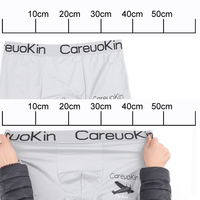 Vente en gros d'usine de Yiwu de caleçons taille moyenne pour hommes, sous-vêtements imprimés avec logo personnalisé, caleçons en tissu extensible faciles à sécher, bons