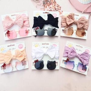 Nuovo Set 2026 Occhiali da Sole per Bambini con Fiocco e Fascia per Capelli, Accessori per Piccole Principesse, Occhiali da Sole Senza Montatura UV400 - Product Image 1