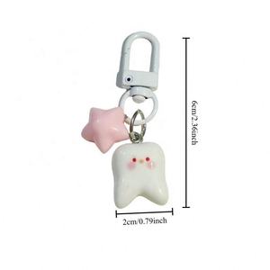 Porte-clés 3D en résine, pendentif étoile rose, forme de dent rose, porte-clés mignons et amusants, cadeaux pour <span class=keywords><strong>clinique</strong></span> dentaire, modèle de dents blanches - Product Image 5