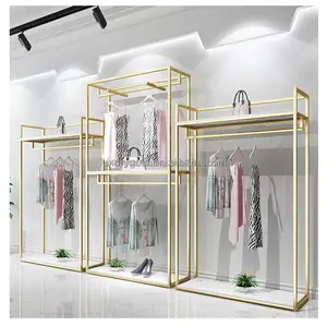 Custom Women Cloth Display Stand Stainless Steel Marble Pattern MDF Clothes Rack Gold Metal Boutique Clothing Racks for Store