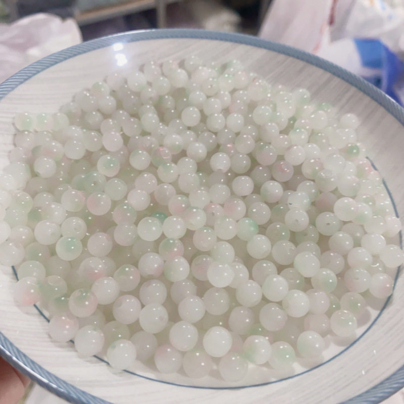 White, green, and pink [8mm light-sensitive color-changing beads]