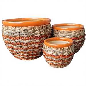 Saigon Flower Ceramic Garden <b>Pot</b> with Drainage Hole Glazed Finish Eco-Friendly Rustic Traditional Design Black Rattan Cover - Product Image 1