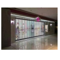 Porte pliante en PVC pour devanture de magasin moderne, panneaux en polycarbonate, cadre en alliage d'aluminium, antivol, anti-poussière, sur mesure