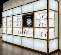 Vitrine murale en aluminium blanc doré à plusieurs niveaux pour montres, avec éclairage LED, dimensions personnalisables, durable et facile à installer