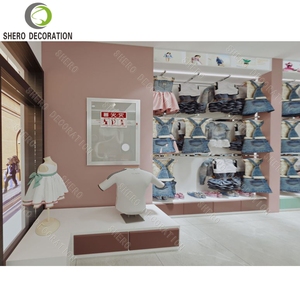 Kids Clothing Shop Design Custom Wall Mounted Metal Clothing Store Display Rack Clothing Store Furniture For Baby Shop Design - Product Image 3