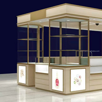 Vitrine de présentation haut de gamme en verre pour bijoux en or et argent, avec éclairage LED, pour comptoir de kiosque et design intérieur de magasin