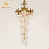 Lustre long en cristal de luxe personnalisable pour hall d'hôtel, projet de villa, escalier, avec décorations en laiton