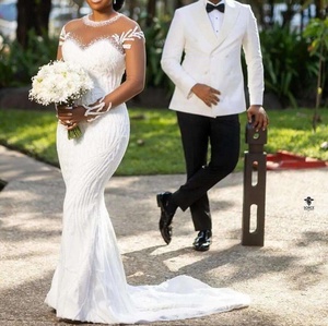 Robe de mariée sirène africaine 2026, col rond illusion, perles, manches longues transparentes, tulle lourd scintillant, coupe ajustée - Product Image 1