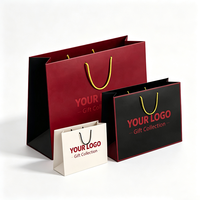 Sac cadeau élégant en papier artistique personnalisé avec poignée en corde, sac fourre-tout en papier mat noir, blanc, vert, vente en gros, pour la promotion de la marque