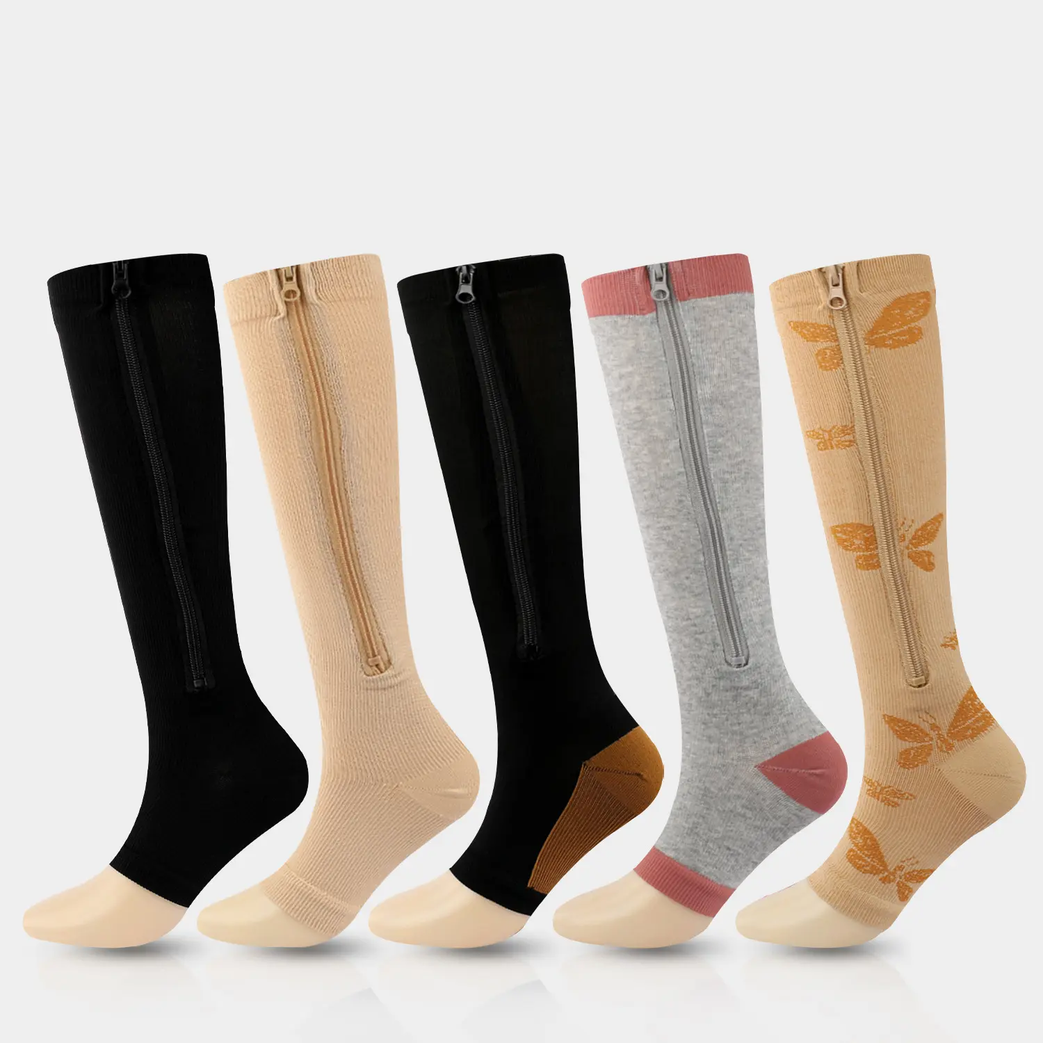 Les chaussettes de pression de sport à haute élasticité peuvent être personnalisées pour protéger les chaussettes de jambe élastiques à fermeture à glissière de compression des vaisseaux sanguins