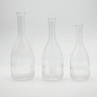Vente en gros usine : Bouteilles à col long haut de gamme de 100 ml, 200 ml, 700 ml avec couvercles pour vin, boissons et whisky