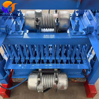 Machine à fabriquer des briques semi-automatique durable et économique pour les travaux de construction avec garantie d'un an