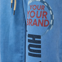 Celana Panjang Pria Model Wide Leg dengan Detail Kancing dan Cetak Huruf Lingkaran Custom, Gaya Streetwear