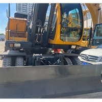 Excavatrice sur pneus Volvo 17 tonnes d'occasion Excavatrice Volvo EW170BLC EW170 EW180 originale suédoise Volvo EW170 pelleteuse