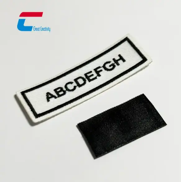 Etiqueta de roupa NFC à prova d'água de 13,56 MHz Etiqueta de lavanderia RFID etiqueta tecida lavável NFC crachá