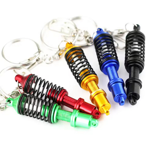 Venta al por mayor de resorte ajustable Mini amortiguador llavero accesorios de coche para regalos - Product Image 1