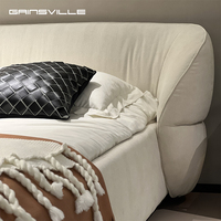 Lit rembourré artisanal moderne avec tête de lit design |   Taille et tissu personnalisables