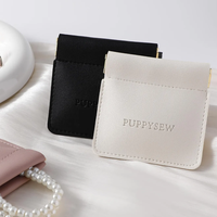 Pochette à bijoux en cuir de luxe, fermeture à pression portable, cuir PU souple, mini sac carré pour boucles d'oreilles, écouteurs, rouge à lèvres