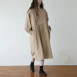 Bouton droit couleur unie Vintage Midi à manches longues a-ligne col rond haute qualité coton lin vêtements femmes robe avec poches