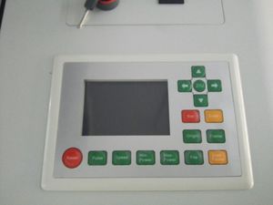 Máquina de corte por láser de posicionamiento CCD SCU1060 para bordado de etiquetas de ropa cortadora láser de impresión Caminal - Product Image 4