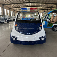 Voiture de sécurité électrique avec barre lumineuse d'avertissement et cabine fermée pour les patrouilles des campus scolaires