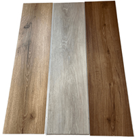 Carreaux et planches de vinyle de luxe imperméables Produits de sol SPC Plancher de salle de bain avec dalles de porcelaine Conceptions sophistiquées Revêtement de sol SPC