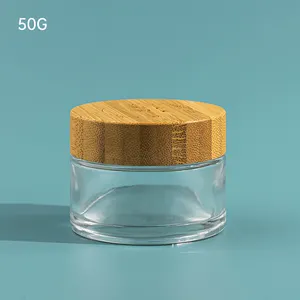 핫 세일 종이 튜브 화장품 투명 유리 병 30g 50g 100g 투명 유리 병 대나무 뚜껑과 로고