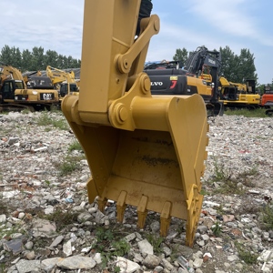 Excavatrice d'occasion CAT 320EL à faible consommation de carburant pour le chargement de pierres de riprap dans de grands camions à benne sur les chantiers - Product Image 5
