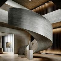 Escalier intérieur en colimaçon moderne de luxe avec cadre en acier Garde-corps en verre incurvé Marches en bois massif pour appartements Duplex Villa