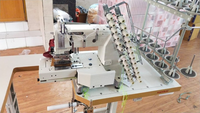 Machine à coudre à double point de chaînette à 12 aiguilles à lit cylindrique Kansai FX-4412P (Modèle 4412 Machine multi-aiguilles)