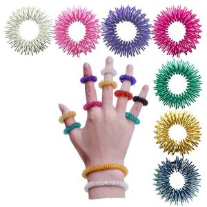 Mini Anneau de Massage des Doigts à Ressort Portable, Cercle de Décompression Anti-stress pour le Bureau et la Maison - Product Image 1