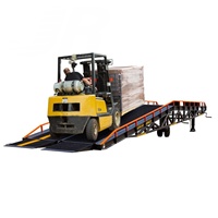 Rampes de chargement hydrauliques mobiles certifiées CE, construction en acier au carbone, garde-corps 60-80 cm, utilisées dans les industries logistiques et des conteneurs