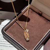 Collier ras-du-cou personnalisé style palais avec perles dorées creuses et rubis, motif filigrane vintage 2026