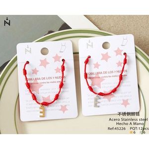 Cavigliera in acciaio inossidabile a sette nodi con lettera E e braccialetto in corda rossa per donna, gioielli alla moda. - Product Image 1