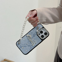 Coque de téléphone en PU avec chaîne de perles et nœud en strass, motif serpent de luxe, pour iPhone 17 Pro Max, compatible également avec les modèles 16, 15, 14