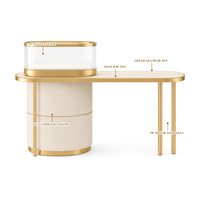 Table de présentation de bijoux sur mesure, vitrine en verre avec bordure dorée et éclairage LED pour magasin de détail et distributeur en gros