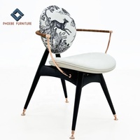 Ensemble de chaises de salle à manger Foshan Phoebe, style moderne, luxe européen, antique, or, acier inoxydable, avec accoudoirs