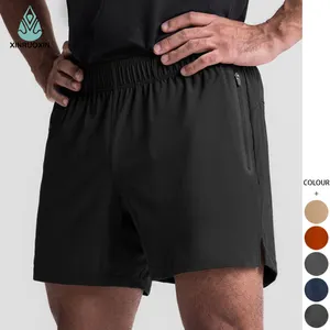 Sport Shorts décontractés pour hommes simple tissé séchage rapide couleur unie course fitness sous le genou shorts Quick Dry Sports Tight