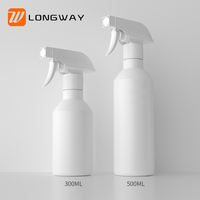 Bouteille d'huile capillaire en plastique personnalisée de 300ml/500ml avec buse de pulvérisation à gâchette Matériau PETG PE Type d'étanchéité de la pompe Emballage de soins capillaires