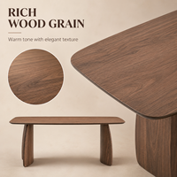 Table à manger de style européen moderne en bois d'acajou avec plateau en oxyde de magnésium à bords arrondis et pieds incurvés