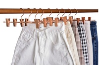 Cintre en métal plaqué cuivre pour pantalons et jupes, avec pince coulissante réglable et embouts en caoutchouc, pour rangement en boutique et placard