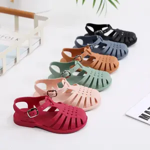 Neuzugang modisches Kleid niedlich rutschfest Baby Kinder Mädchen Angebote Feiertag Buckle Strap Strand Gelee Schuhe Sandalen 2024