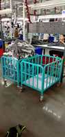Chariot de manutention personnalisé pour matériaux de couture, chariot à cage en treillis métallique en acier pour la fabrication de vêtements