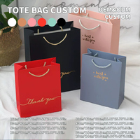 Bolsa de Papel Mate Blanca con Asa de Cinta y Logotipo Personalizado para Tiendas, Ideal para Empacar Ropa, Zapatos y Calcetines