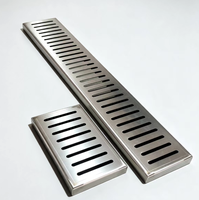 Système de drainage à rainures en acier inoxydable, assemblé avec grille de couverture, utilisé pour le drainage des sols de cuisines extérieures et des parkings