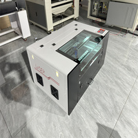 JingKe 2024 la dernière machine de gravure laser co2 50W 60W 80W 100W 6040 pour bois acrylique avec système Ruida M3