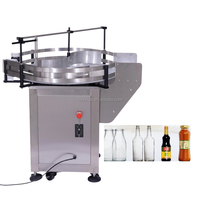 Machine d'alimentation rotative semi-automatique pour bouteilles, plateau tournant pour le débouclage et le tri des bouteilles en plastique pour l'emballage de bouteilles de shampoing