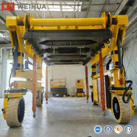 Grue portique à conteneurs WEIHUA 40 tonnes sur pneus en caoutchouc pour la logistique de conteneurs en entrepôt - Prix