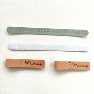Fabricant <span class=keywords><strong>de</strong></span> gros en <span class=keywords><strong>cuir</strong></span> logo gaufré étiquette en <span class=keywords><strong>cuir</strong></span> pliable auto-adhésif <span class=keywords><strong>bande</strong></span> en <span class=keywords><strong>cuir</strong></span> accessoires <span class=keywords><strong>de</strong></span> bagages - Product Image 1